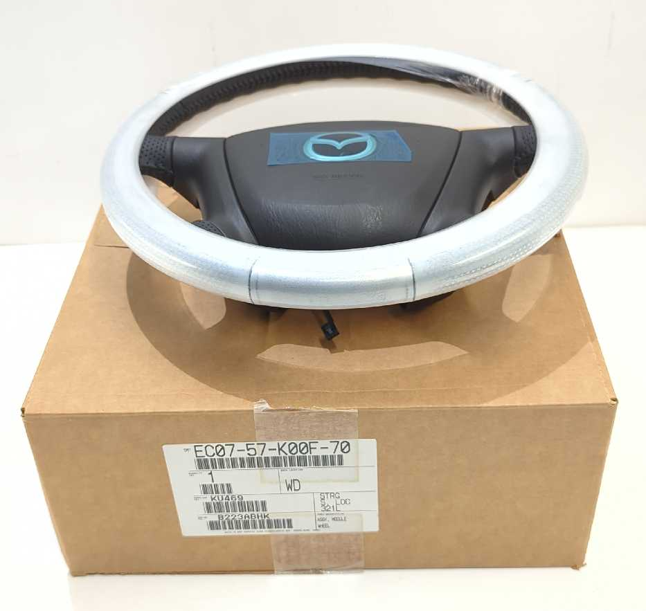 New OEM genuine Mazda Black Leather Steering Wheel 2001-2004 Tribute new in box EC0757K00F70